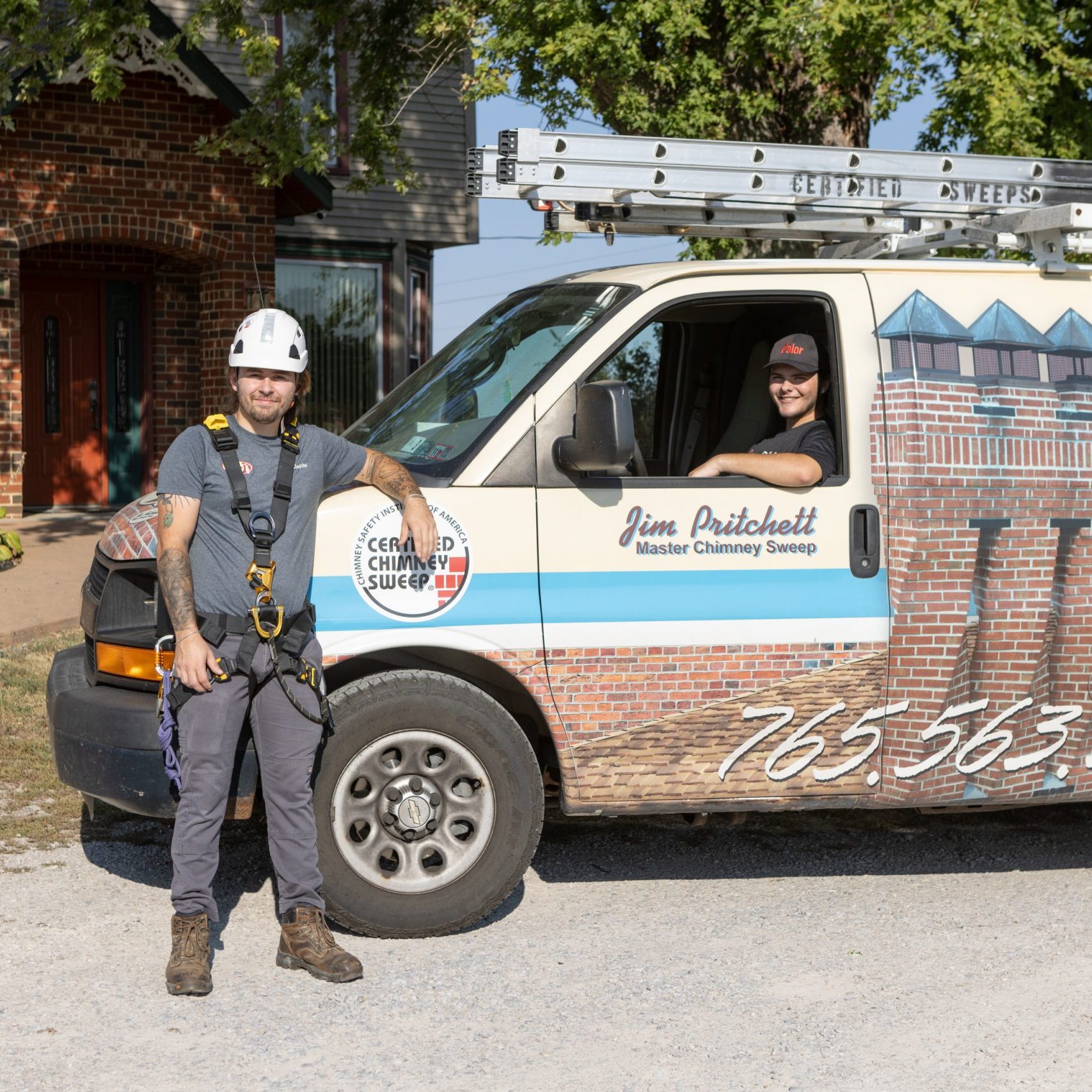 Certified Sweeps truck & employees